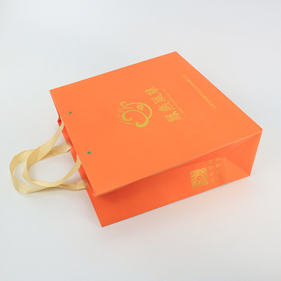 O presente de compra marcado lustroso Logo Paper Bags With Rope feito sob encomenda segura