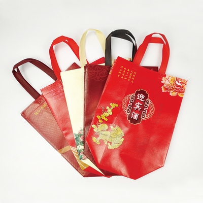 Sacolas de embrulho para presente com logotipo impresso personalizado à prova d'água Suporte de alça cortada sob pressão Bolsa única para garrafa de vinho