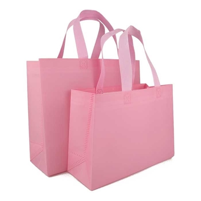 O mantimento imprimiu o psiquiatra respirável não tecido do rosa 65gsm dos sacos de compras resistente