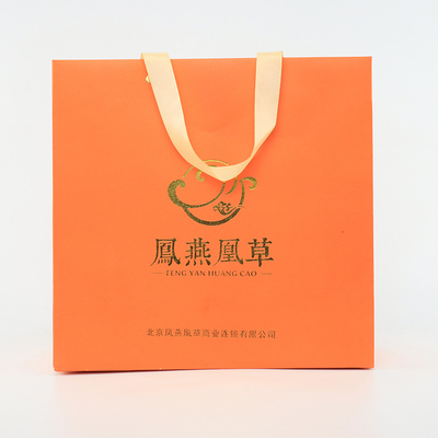 O presente de compra marcado lustroso Logo Paper Bags With Rope feito sob encomenda segura